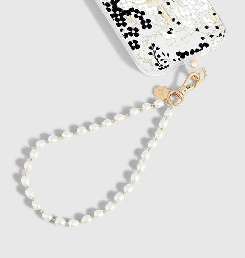 Kate Spade Sea Pearl phone charm wrist strap, elegant and stylish phone accessory.