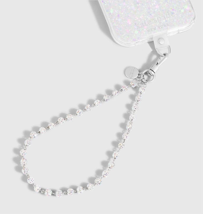 Kate Spade Razzle Dazzle phone charm wrist strap, adds sparkle and style.